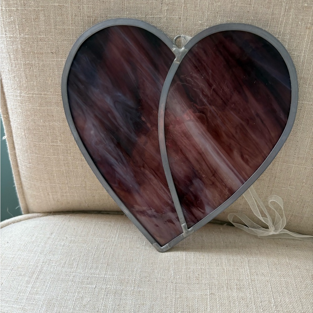 Purple stained glass heart with silver outlines and hanger.